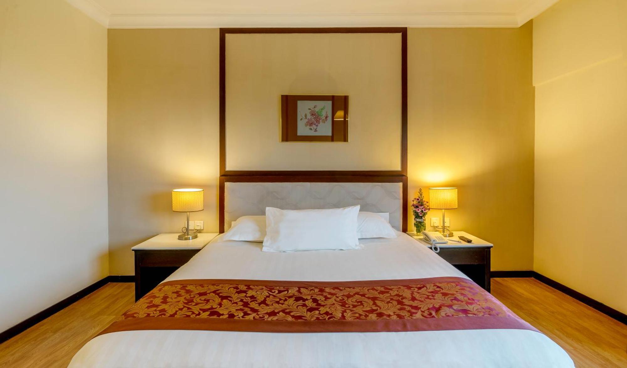 Deluxe Zimmer mit Kingsize-Bett