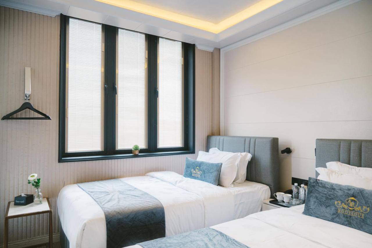 Tweepersoonskamer met 2 Aparte Bedden en Balkon